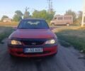 Красный Опель Астра, объемом двигателя 2 л и пробегом 222 тыс. км за 751 $, фото 1 на Automoto.ua