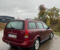 Червоний Опель Астра, об'ємом двигуна 2 л та пробігом 330 тис. км за 2750 $, фото 2 на Automoto.ua