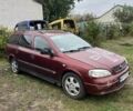 Красный Опель Астра, объемом двигателя 2 л и пробегом 80 тыс. км за 550 $, фото 1 на Automoto.ua
