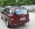 Красный Опель Астра, объемом двигателя 1.6 л и пробегом 200 тыс. км за 1650 $, фото 3 на Automoto.ua