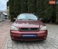 Красный Опель Астра, объемом двигателя 1.6 л и пробегом 266 тыс. км за 3500 $, фото 7 на Automoto.ua