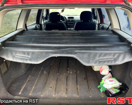 Красный Опель Астра, объемом двигателя 1.4 л и пробегом 311 тыс. км за 2450 $, фото 2 на Automoto.ua