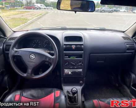 Красный Опель Астра, объемом двигателя 1.4 л и пробегом 311 тыс. км за 2450 $, фото 1 на Automoto.ua