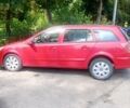 Красный Опель Астра, объемом двигателя 1.6 л и пробегом 220 тыс. км за 4300 $, фото 7 на Automoto.ua