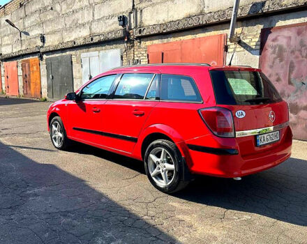 Красный Опель Астра, объемом двигателя 1.9 л и пробегом 290 тыс. км за 5000 $, фото 2 на Automoto.ua