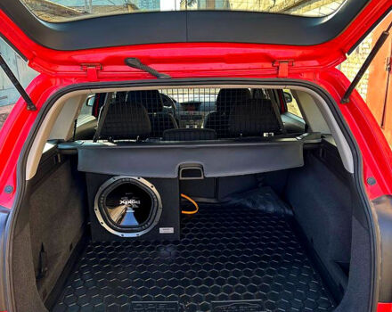 Красный Опель Астра, объемом двигателя 1.9 л и пробегом 290 тыс. км за 5000 $, фото 13 на Automoto.ua