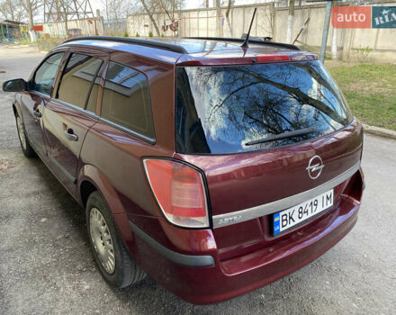 Червоний Опель Астра, об'ємом двигуна 1.4 л та пробігом 210 тис. км за 4200 $, фото 1 на Automoto.ua