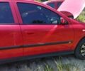 Красный Опель Астра, объемом двигателя 1.6 л и пробегом 398 тыс. км за 3500 $, фото 24 на Automoto.ua
