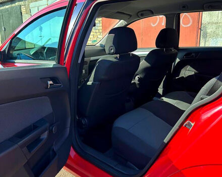 Красный Опель Астра, объемом двигателя 1.9 л и пробегом 290 тыс. км за 5000 $, фото 11 на Automoto.ua