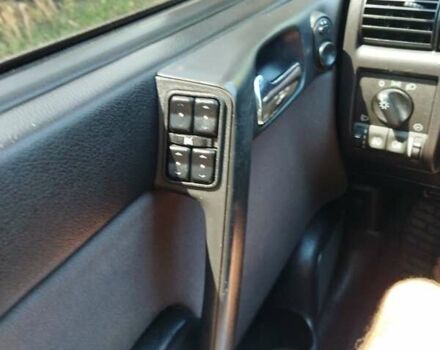 Красный Опель Астра, объемом двигателя 1.6 л и пробегом 398 тыс. км за 3500 $, фото 9 на Automoto.ua