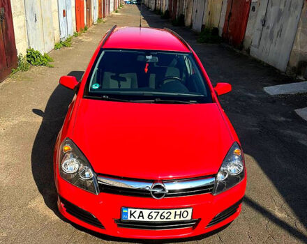 Красный Опель Астра, объемом двигателя 1.9 л и пробегом 290 тыс. км за 5000 $, фото 4 на Automoto.ua