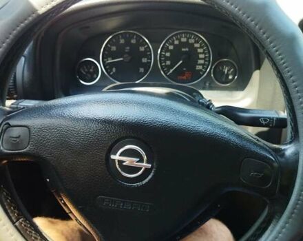 Красный Опель Астра, объемом двигателя 1.6 л и пробегом 398 тыс. км за 3500 $, фото 10 на Automoto.ua
