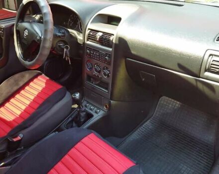 Красный Опель Астра, объемом двигателя 1.6 л и пробегом 398 тыс. км за 3500 $, фото 25 на Automoto.ua