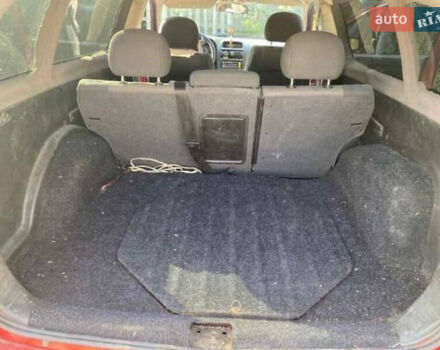 Красный Опель Астра, объемом двигателя 1.7 л и пробегом 335 тыс. км за 2800 $, фото 8 на Automoto.ua
