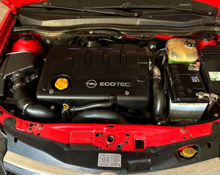 Красный Опель Астра, объемом двигателя 1.9 л и пробегом 290 тыс. км за 5000 $, фото 6 на Automoto.ua