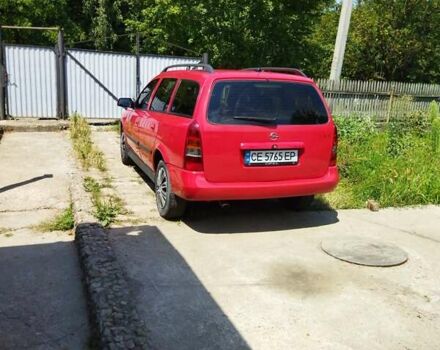 Красный Опель Астра, объемом двигателя 1.6 л и пробегом 398 тыс. км за 3500 $, фото 2 на Automoto.ua