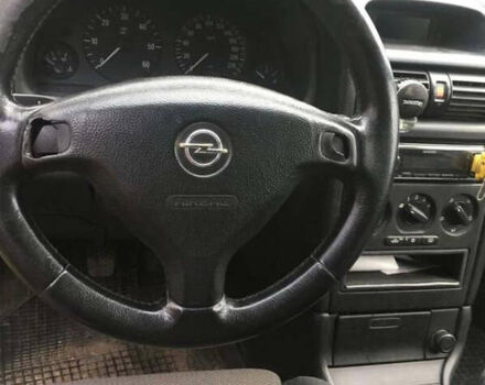 Красный Опель Астра, объемом двигателя 1.7 л и пробегом 335 тыс. км за 2800 $, фото 5 на Automoto.ua