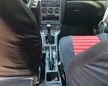 Красный Опель Астра, объемом двигателя 1.6 л и пробегом 398 тыс. км за 3500 $, фото 7 на Automoto.ua