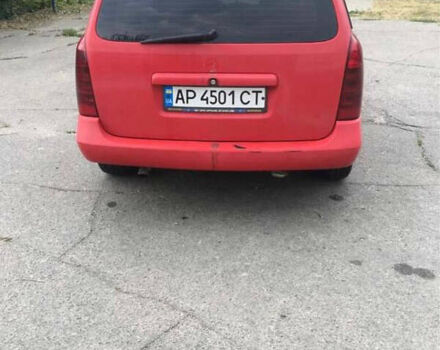 Красный Опель Астра, объемом двигателя 1.7 л и пробегом 335 тыс. км за 2800 $, фото 4 на Automoto.ua