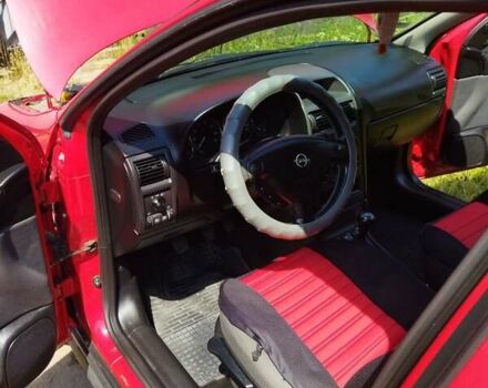 Красный Опель Астра, объемом двигателя 1.6 л и пробегом 398 тыс. км за 3500 $, фото 32 на Automoto.ua