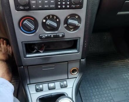 Красный Опель Астра, объемом двигателя 1.6 л и пробегом 398 тыс. км за 3500 $, фото 13 на Automoto.ua