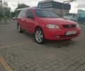 Красный Опель Астра, объемом двигателя 1.7 л и пробегом 300 тыс. км за 2350 $, фото 1 на Automoto.ua