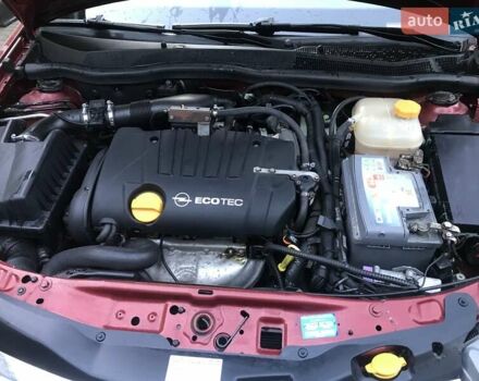 Красный Опель Астра, объемом двигателя 1.8 л и пробегом 244 тыс. км за 5300 $, фото 1 на Automoto.ua