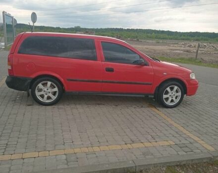 Красный Опель Астра, объемом двигателя 1.7 л и пробегом 300 тыс. км за 2350 $, фото 5 на Automoto.ua