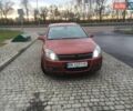 Красный Опель Астра, объемом двигателя 1.36 л и пробегом 176 тыс. км за 4700 $, фото 5 на Automoto.ua