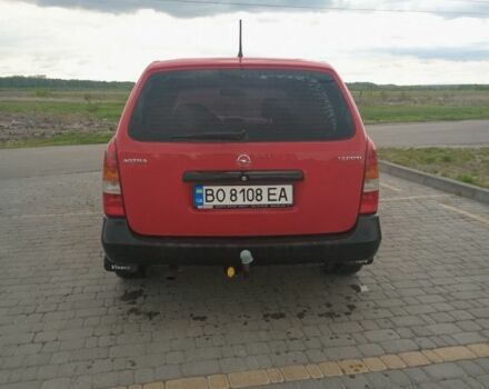 Красный Опель Астра, объемом двигателя 1.7 л и пробегом 300 тыс. км за 2350 $, фото 4 на Automoto.ua
