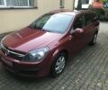 Красный Опель Астра, объемом двигателя 1.8 л и пробегом 244 тыс. км за 5300 $, фото 1 на Automoto.ua