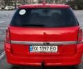 Красный Опель Астра, объемом двигателя 1.9 л и пробегом 332 тыс. км за 5500 $, фото 6 на Automoto.ua