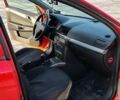 Красный Опель Астра, объемом двигателя 1.9 л и пробегом 332 тыс. км за 5500 $, фото 13 на Automoto.ua