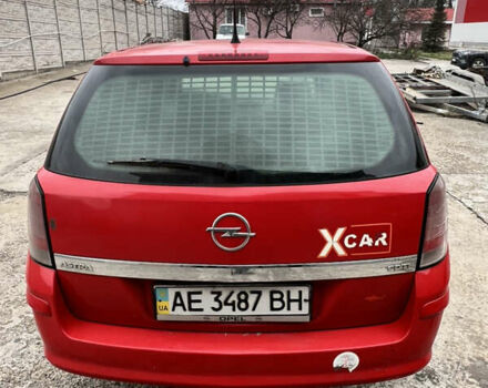 Красный Опель Астра, объемом двигателя 1.3 л и пробегом 539 тыс. км за 4000 $, фото 2 на Automoto.ua