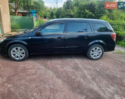 Красный Опель Астра, объемом двигателя 1.6 л и пробегом 240 тыс. км за 5200 $, фото 6 на Automoto.ua