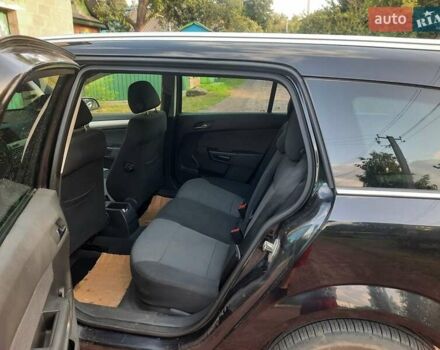 Красный Опель Астра, объемом двигателя 1.6 л и пробегом 240 тыс. км за 5200 $, фото 2 на Automoto.ua