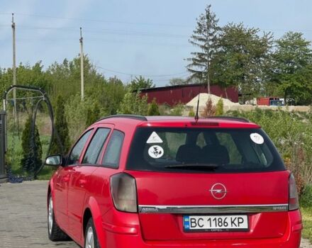 Красный Опель Астра, объемом двигателя 1.7 л и пробегом 380 тыс. км за 3500 $, фото 1 на Automoto.ua