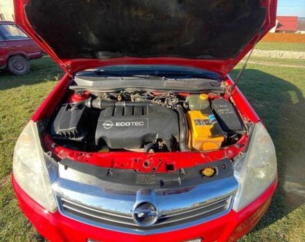 Красный Опель Астра, объемом двигателя 1.2 л и пробегом 260 тыс. км за 4600 $, фото 2 на Automoto.ua