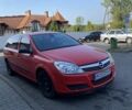Красный Опель Астра, объемом двигателя 1.25 л и пробегом 230 тыс. км за 4000 $, фото 1 на Automoto.ua