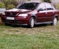 Красный Опель Астра, объемом двигателя 1.4 л и пробегом 379 тыс. км за 2804 $, фото 1 на Automoto.ua