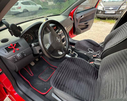 Красный Опель Астра, объемом двигателя 1.6 л и пробегом 216 тыс. км за 5000 $, фото 8 на Automoto.ua