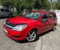 Красный Опель Астра, объемом двигателя 1.6 л и пробегом 156 тыс. км за 5500 $, фото 1 на Automoto.ua