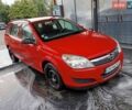 Красный Опель Астра, объемом двигателя 1.6 л и пробегом 297 тыс. км за 4650 $, фото 1 на Automoto.ua