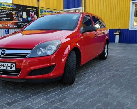Красный Опель Астра, объемом двигателя 1.4 л и пробегом 217 тыс. км за 4950 $, фото 3 на Automoto.ua