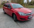Червоний Опель Астра, об'ємом двигуна 1.4 л та пробігом 221 тис. км за 4699 $, фото 1 на Automoto.ua