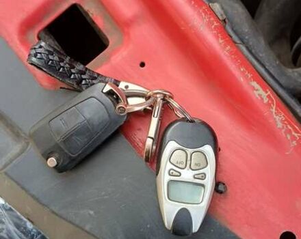 Красный Опель Астра, объемом двигателя 1.6 л и пробегом 187 тыс. км за 5900 $, фото 10 на Automoto.ua