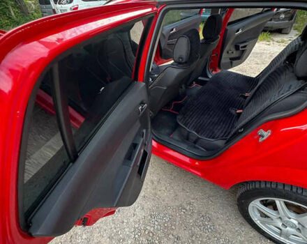 Красный Опель Астра, объемом двигателя 1.6 л и пробегом 216 тыс. км за 5000 $, фото 13 на Automoto.ua