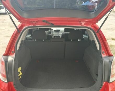 Красный Опель Астра, объемом двигателя 1.4 л и пробегом 217 тыс. км за 4950 $, фото 4 на Automoto.ua