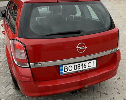 Красный Опель Астра, объемом двигателя 1.7 л и пробегом 246 тыс. км за 5200 $, фото 2 на Automoto.ua