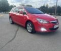 Красный Опель Астра, объемом двигателя 1.4 л и пробегом 207 тыс. км за 7500 $, фото 1 на Automoto.ua